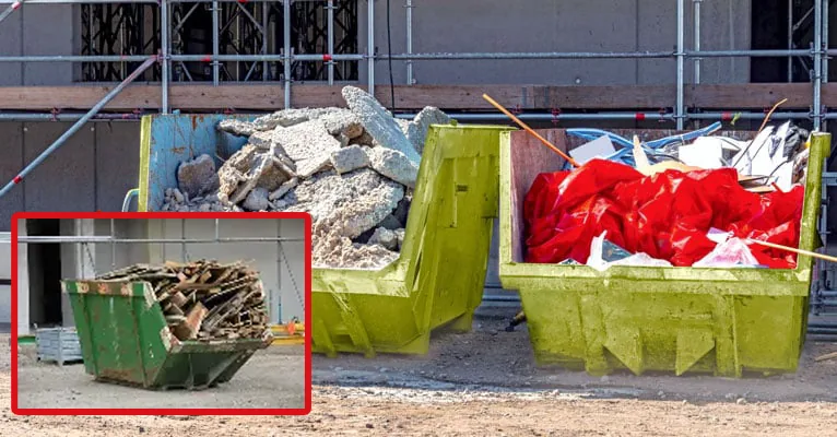 Contenedores de residuos de construcción separados por material en una obra, listos para enviar el escombro a recuperación y reciclaje en lugar de al vertedero.
